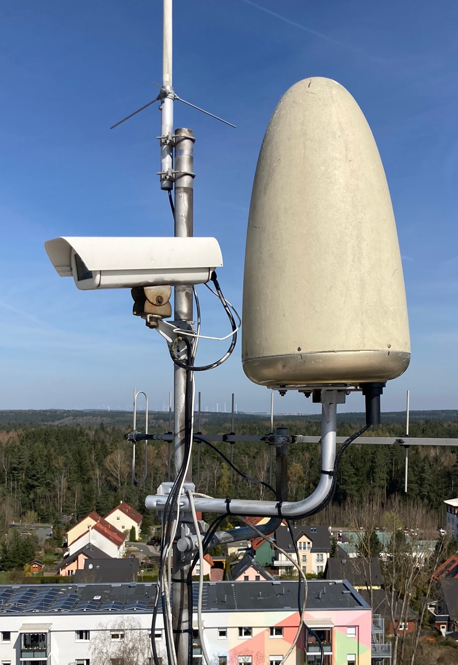 10 GHz beacon outdoor unit under weather-proof radome.